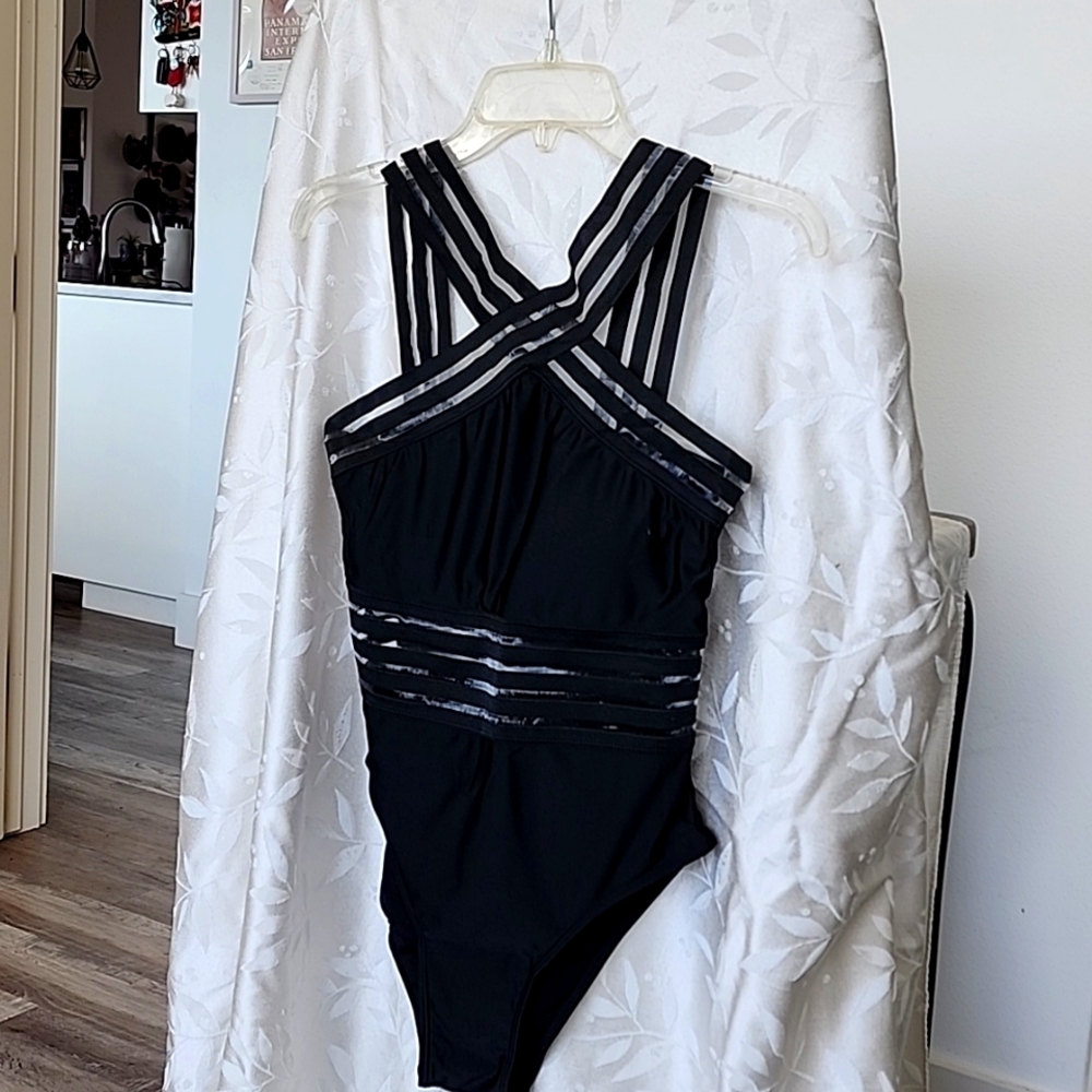One piece swimsuit.